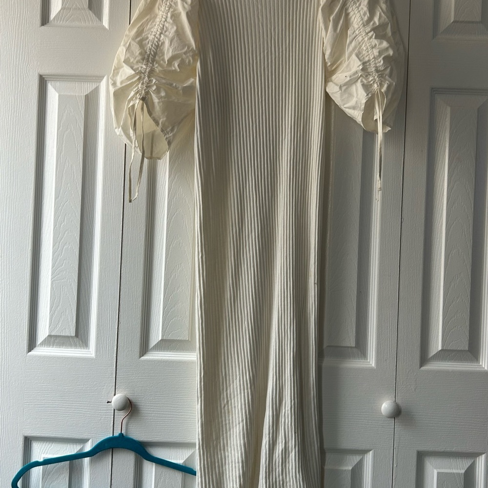 Large Zara Cream Dress with Puffed Ruffle Sleeves, opening in the back.